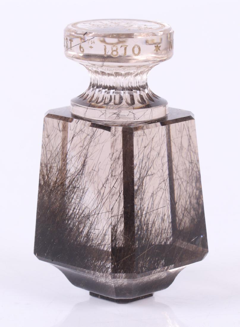 A 19th Century Russian Rock Crystal Seal: Inscribed "Nijni Novgorod, August 6th 1870", rock crystal with oxide of titanium crystals. With original fitted box. Dimensions: 1 1/4" x 1 1/8", 2 1/2" tall. The box is 3 1/4" x 2 1/4" x 1 3/4". Prov