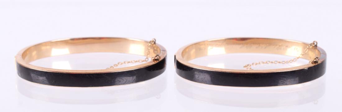 Two 19th c.14k Gold and Enamel Mourning Bracelets: Each with an engraved and chained clasp. Dimensions: The total approximate gross weight is 14.9 dwt. Each measures 2 3/8" x 2". Provenance: From a local estate.