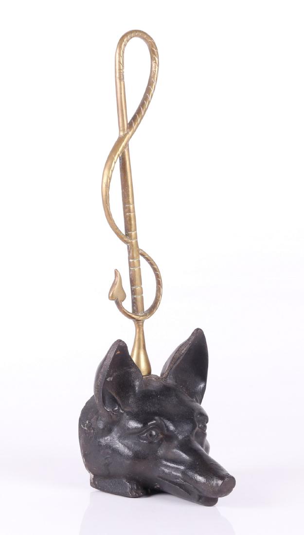A Cast Iron and Brass Doorstop, Fox, Hunting: Late 19th or early 20th century, black painted cast iron, unmarked. Dimensions: 5" x 6", 16" tall. Provenance: From a local estate.