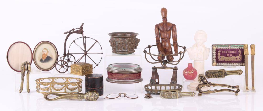 Estate Lot Including Metalware, Nutcrackers, etc.: Comprising: five brass nutcrackers, three are Shakespeare souvenirs, one is in the form of a jester, and the other is decorated with a dancing couple; a pair of Egyptian Revival ormolu pieces; a figur