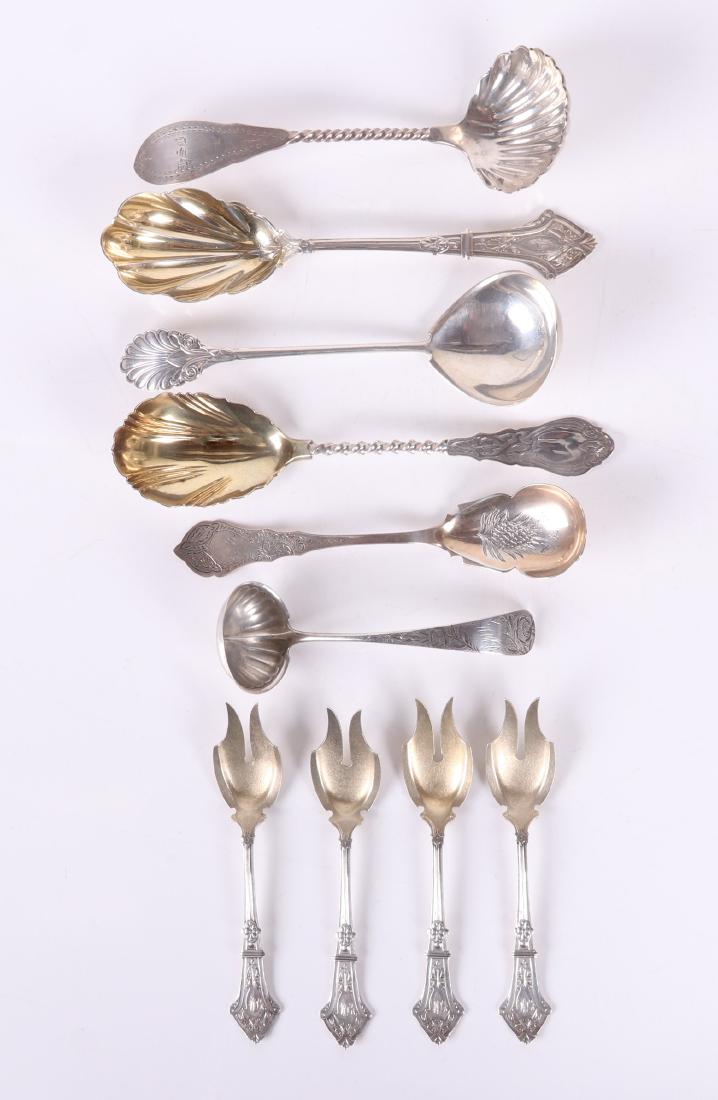 Coin and Sterling Silver Including George Sharp: Comprising: a Gorham sauce ladle, a serving spoon with palmette terminal simply marked "Coin", a Shreve, Brown and Co. gravy ladle with a shell form bowl, a serving spoon with pineapple engraved decor