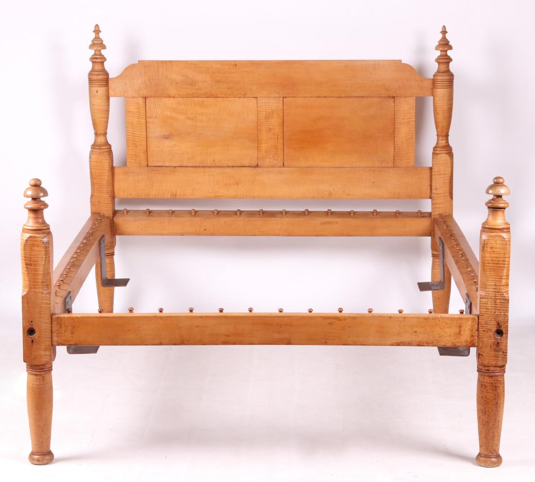 An American Tiger Maple 19th Century Bed: Mid 19th century. With mushroom and spire turned terminals, with a paneled headboard. Modern irons have been added for holding a mattress Dimensions: The inside measurement for the mattress is 73" x 5
