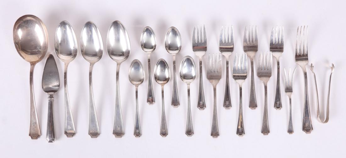 Sterling Silver, "Fairfax" by Gorham and Durgin: Comprising: a 9" casserole spoon, three 8 3/8" tablespoons, five 5 3/4" teaspoons, a 7 3/4" dinner fork, seven 6" salad forks, a 4 3/4" lemon fork, a 6 1/2" hollow sterling handle cheese server, 4 1/2