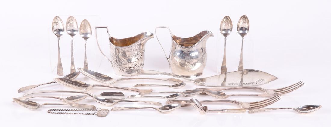 Georgian Sterling Silver Including Paul Storr: Comprising: Two George III creamers dated for 1801 and 1806, a Fish slice marked for London, the Maker John Edwards and the year 1801, an early 18th century rat tail spoon with worn hallmarks, fourtee
