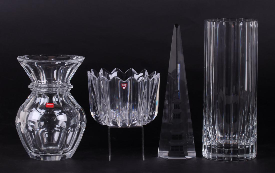 Four Glass Pieces: Baccarat, Orrefors, Hoya: Two Baccarat vases, "Harmonie", 4 5/8" in diameter x 12" tall, and an unidentified pattern with heptagonal sides and flared rim, 5 3/4" x 8 3/4", both signed, the unidentified vase also with original