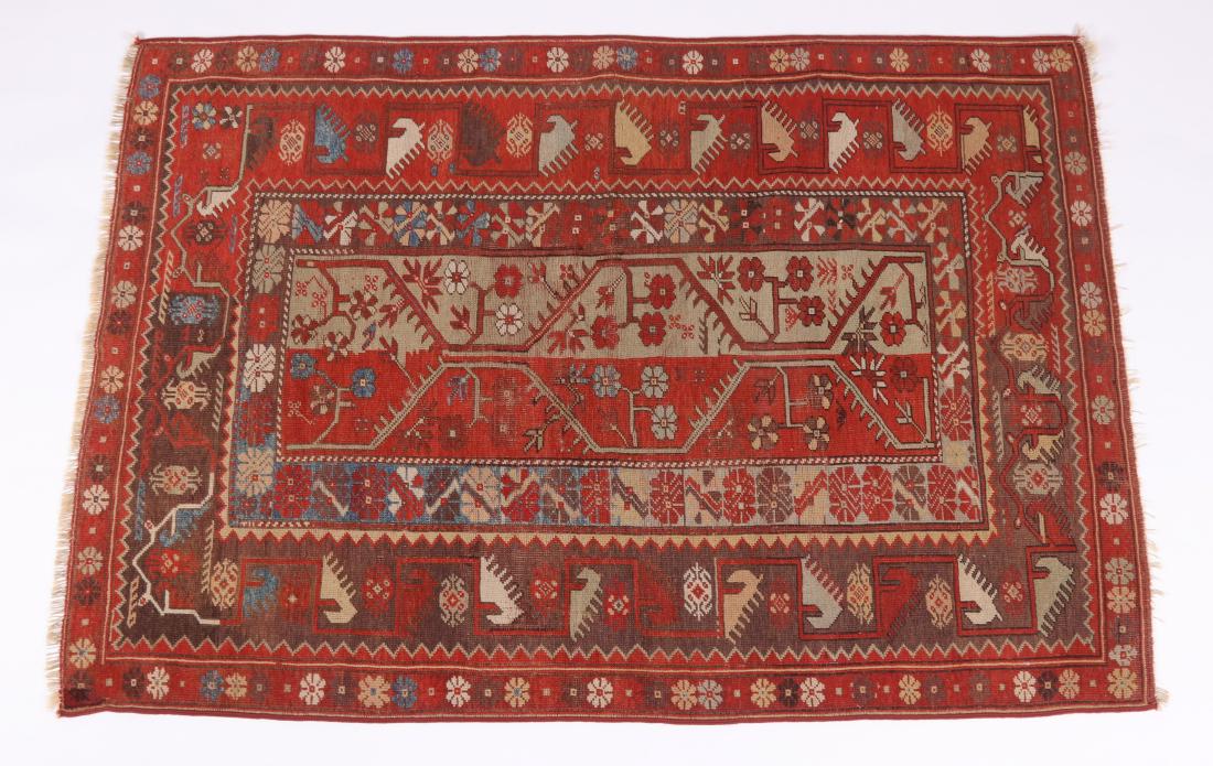 Rug/Carpet, Antique Turkish Village Example: Central panel with geometric tendril vines and flowers, surrounded by a main border with brick red background and repeating geometric device. Dimensions: 5' 2" x 3' 6". Provenance: From a local estate