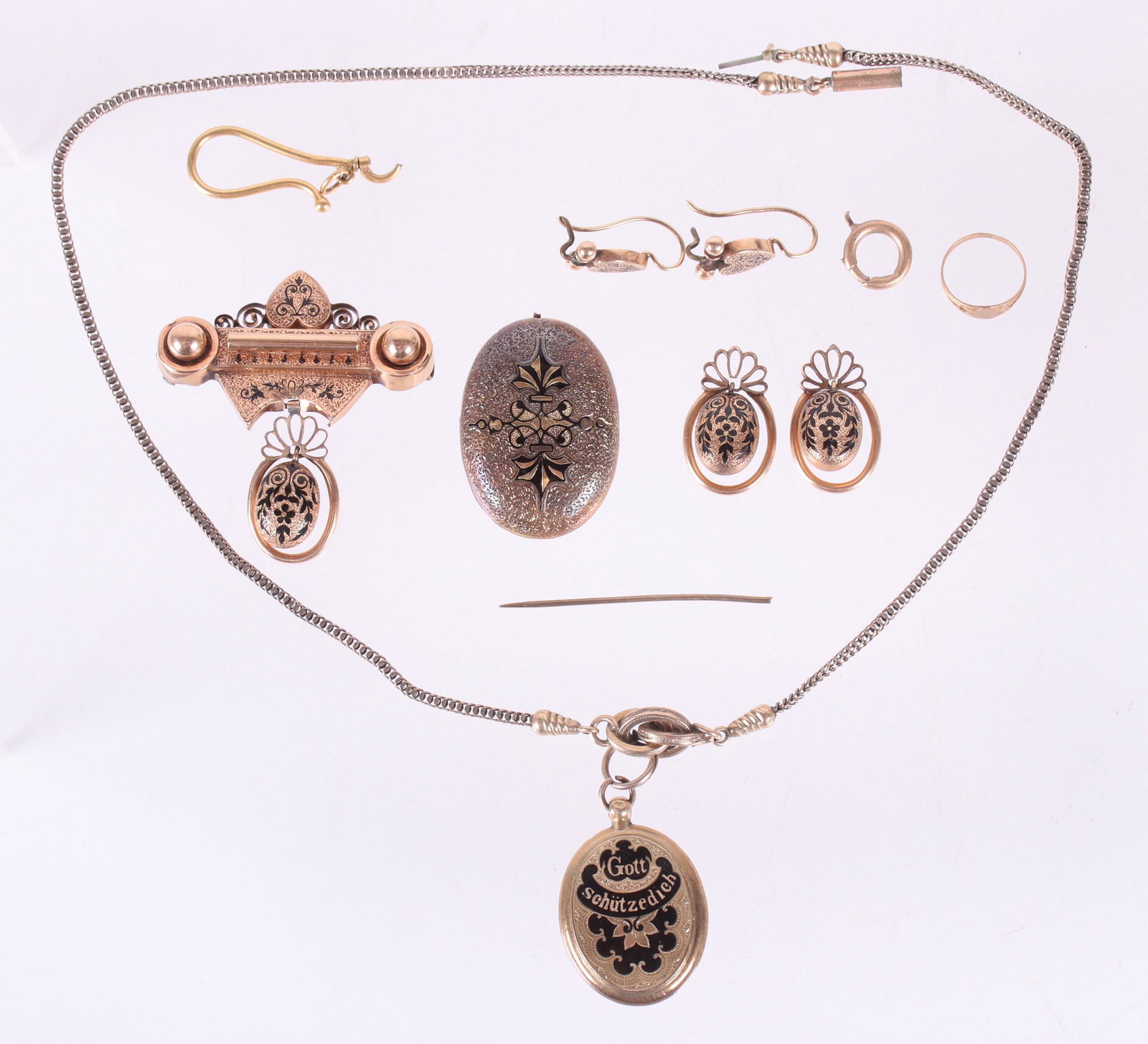 A Group of Victorian Gold Jewelry: A 14k mourning pin/pendant with black enamel decoration and matching earrings, a 10k locket and chain with black enamel and German text, a 10k baby ring, an 18k fragment, a pair of 14k heart shaped ea