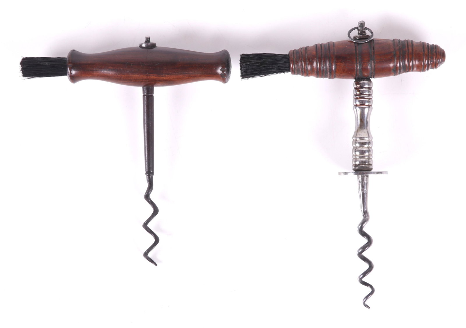 Two 19th Century English Corkscrews: Each with a wooden handle and brush, both unmarked. Dimensions: Each is approximately 5" x 6 1/2".