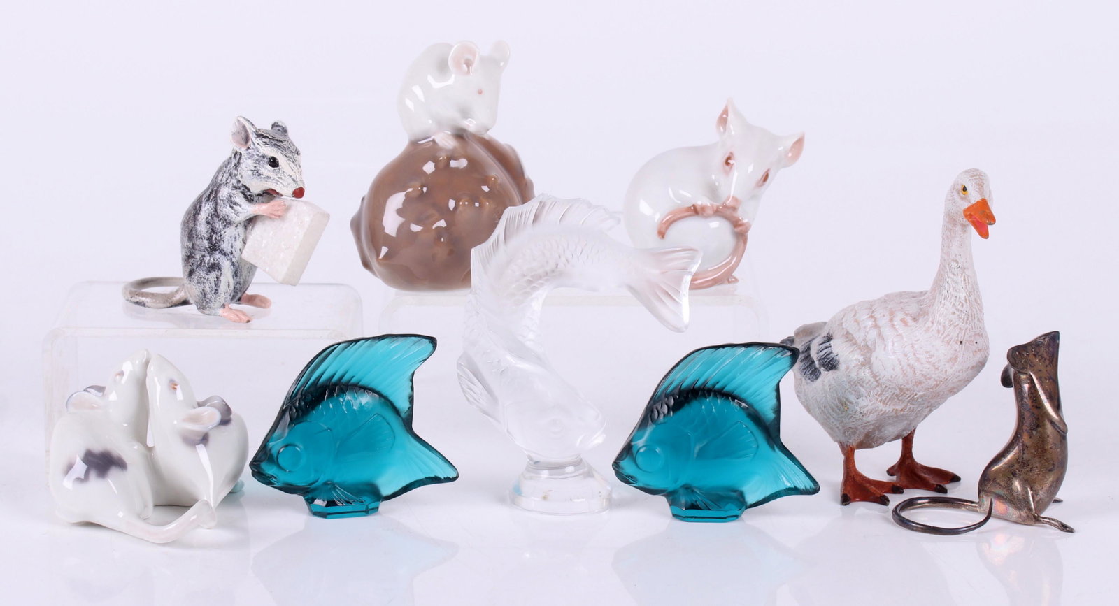 A Group of Small Animal Figures Including Lalique: Comprising: A group of two porcelain mice by Royal Copenhagen, a frosted koi fish by Lalique, a porcelain mouse by Royal Copenhagen, a cold painted bronze goose, a sterling silver mouse by Tiffany and