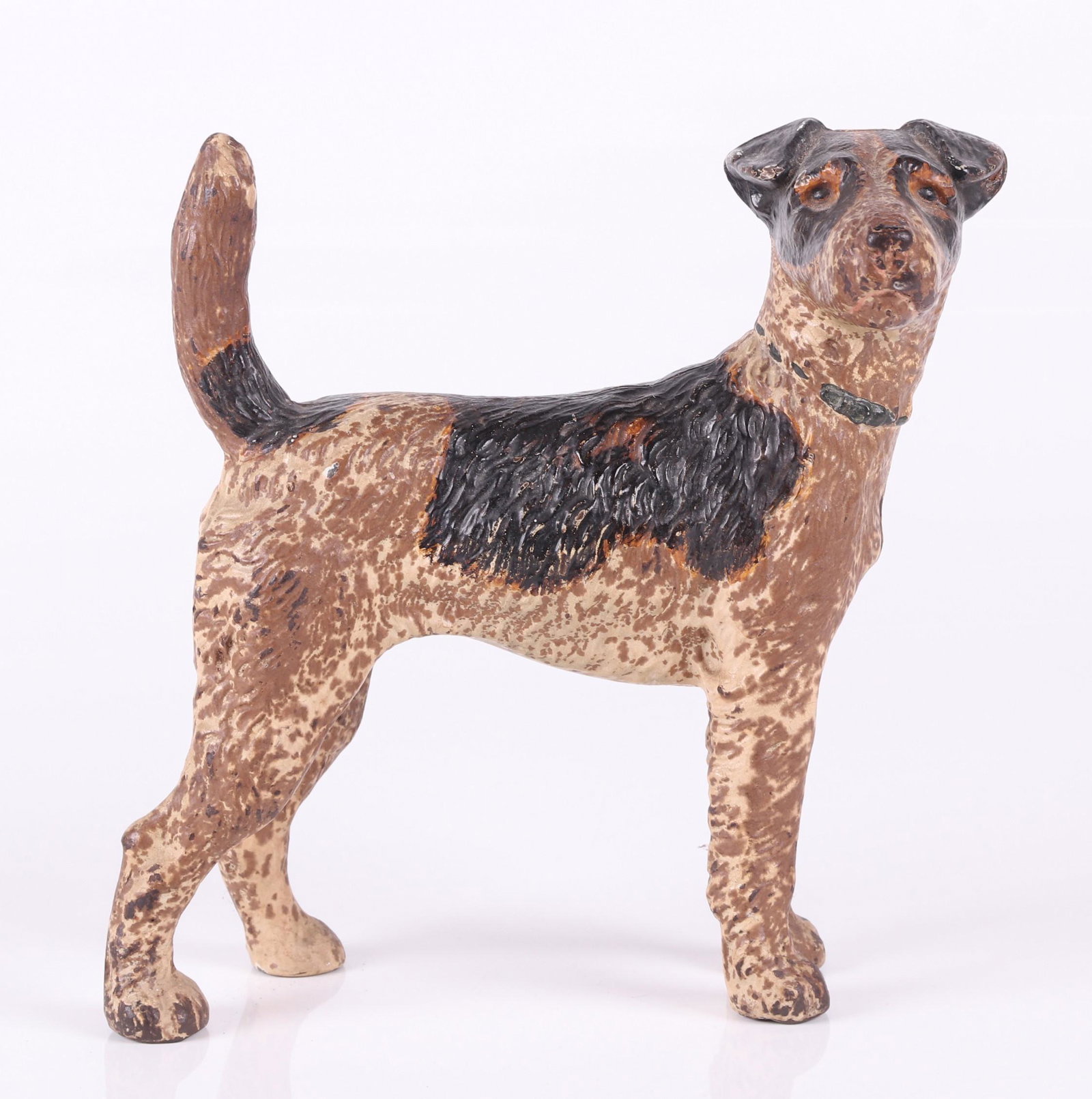 Cast Iron Fox Terrier Doorstop: Hubley no. 279, retains original paint. Dimensions: 8" x 4", 8 1/2" tall. Provenance: From a local estate.
