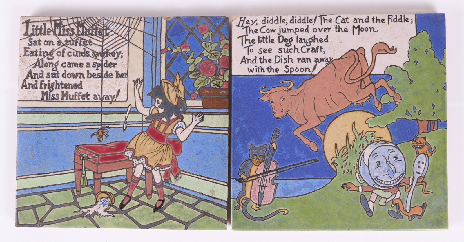 Two Large Arts and Crafts Era Empire Tiles: Two large nursery rhyme tiles, one for "Hey diddle, diddle....." and the other "Little Miss Muffet". Each with impressed mark verso. Dimensions: Each is 12 1/4" x 12 1/4". Provenance: From a local est
