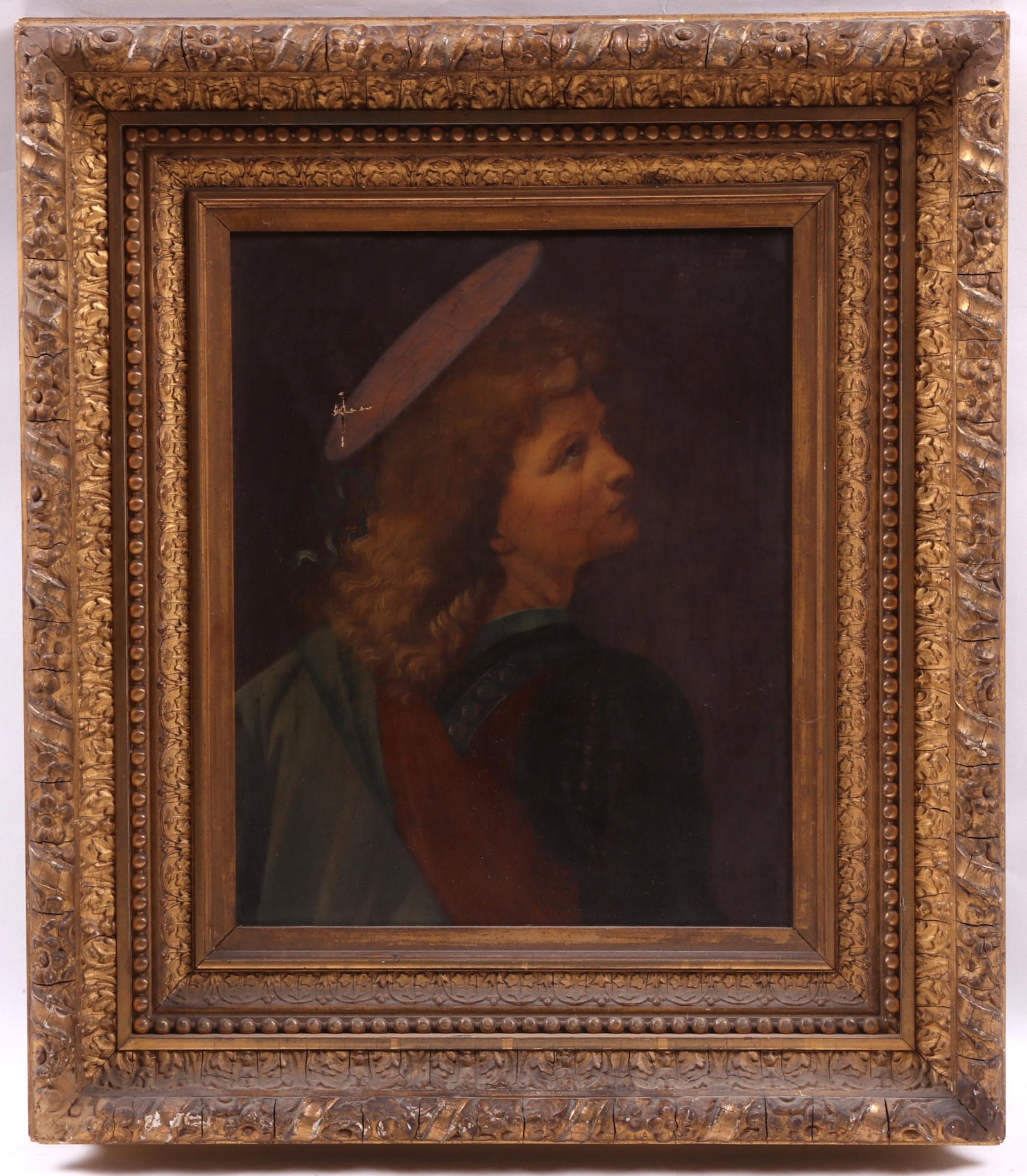 Continental School, 19th Century O/C: A portrait of a saint or angel, unsigned. In the original gilt gesso frame. Likely after an Old Master work. Dimensions: 15" x 13", the frame 22 1/4" x 19 1/2". Provenance: From a local collection.
