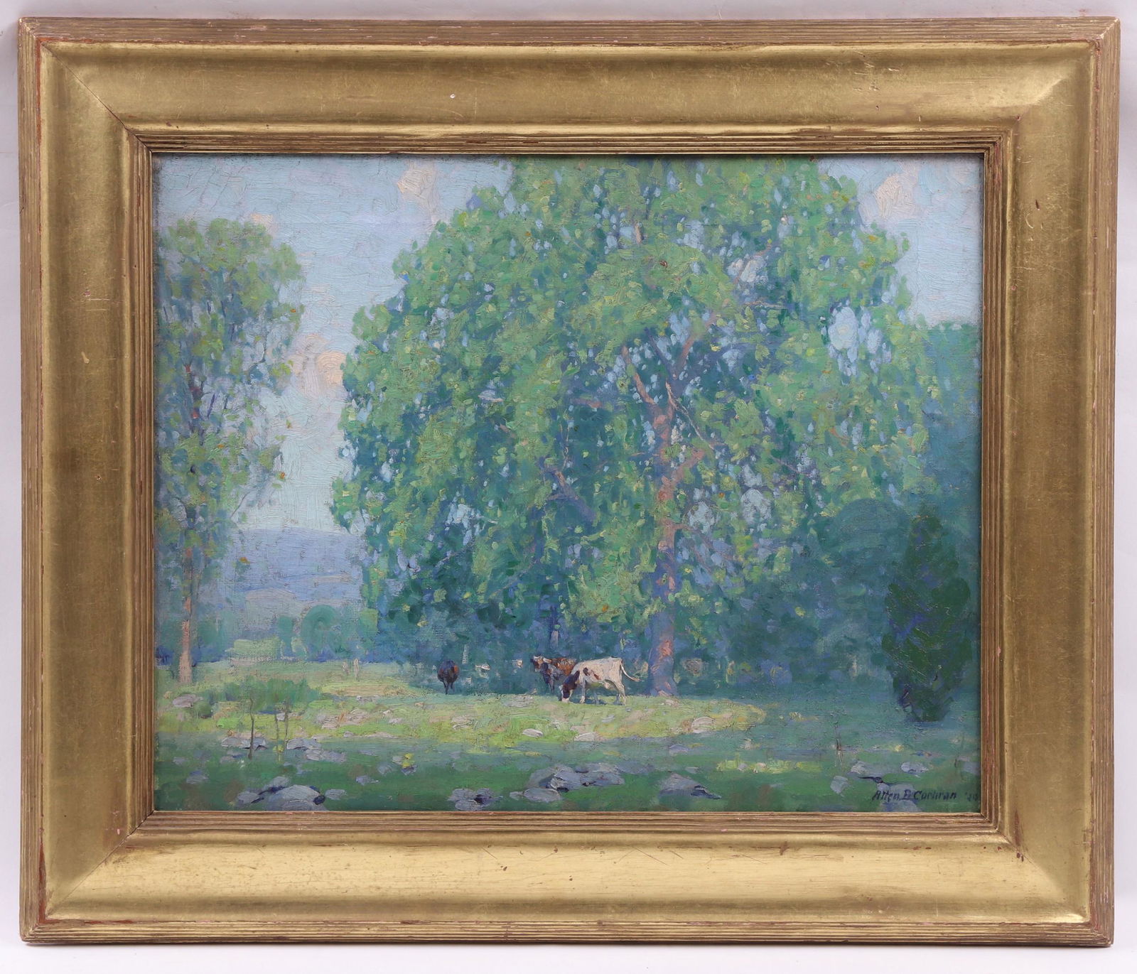 Allen Dean Cochran (1888 - 1971) Oil on Canvas: A landscape with cows titled "Summer Day" on a tag verso, with hand carved gilt frame labeled "M. Grieve Co. New York and London" the canvas signed and dated for 1929. Dimensions: 16" x 20", the frame