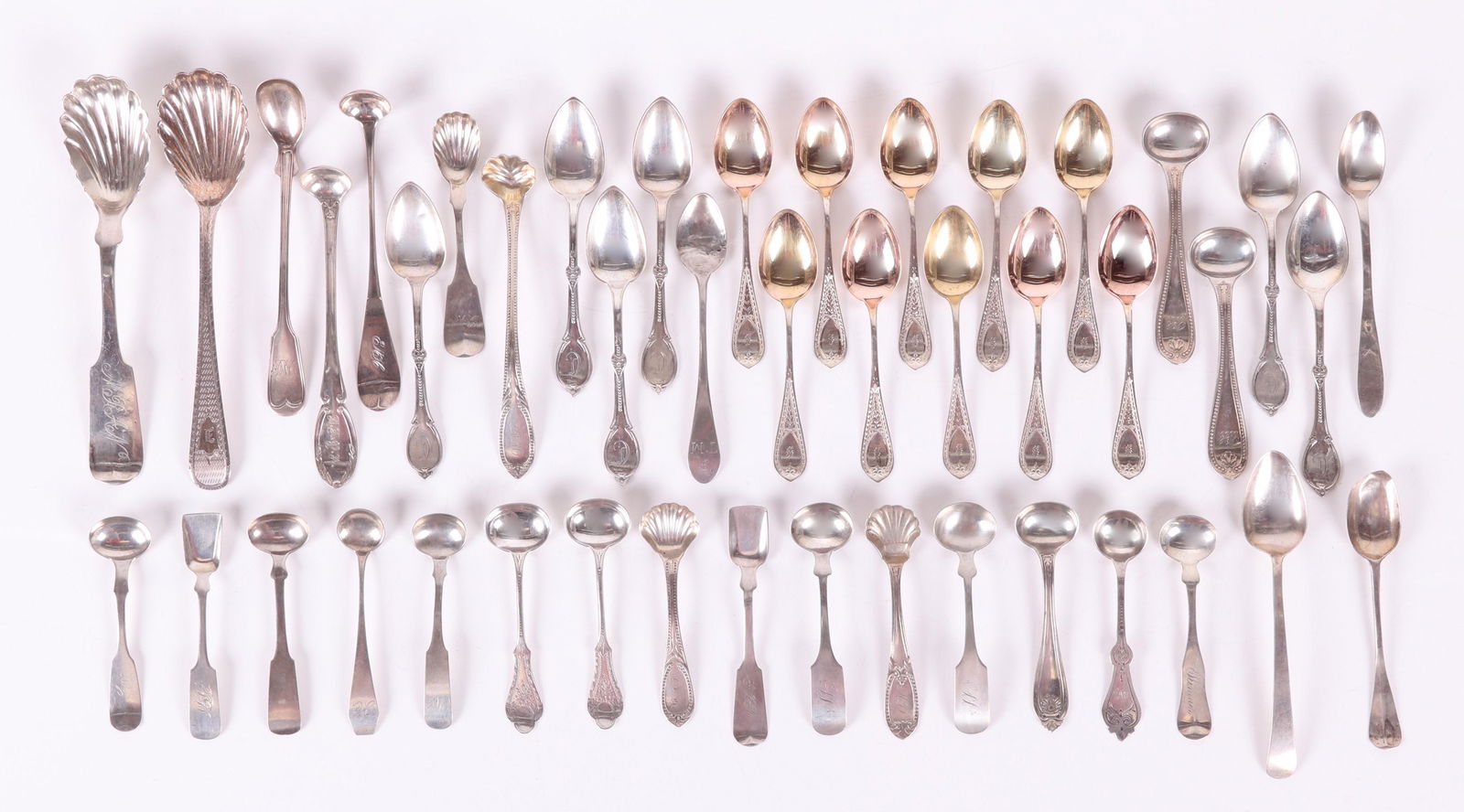 Coin Silver Demitasse, Salt, Condiment Spoons: Demitasse spoons, including a set of six by Frances A. Bunnell, a set of ten with gold washed bowls and bright cut decoration by Whiting, also marked for M. W. Galt, and four others, by Henry Andrews,