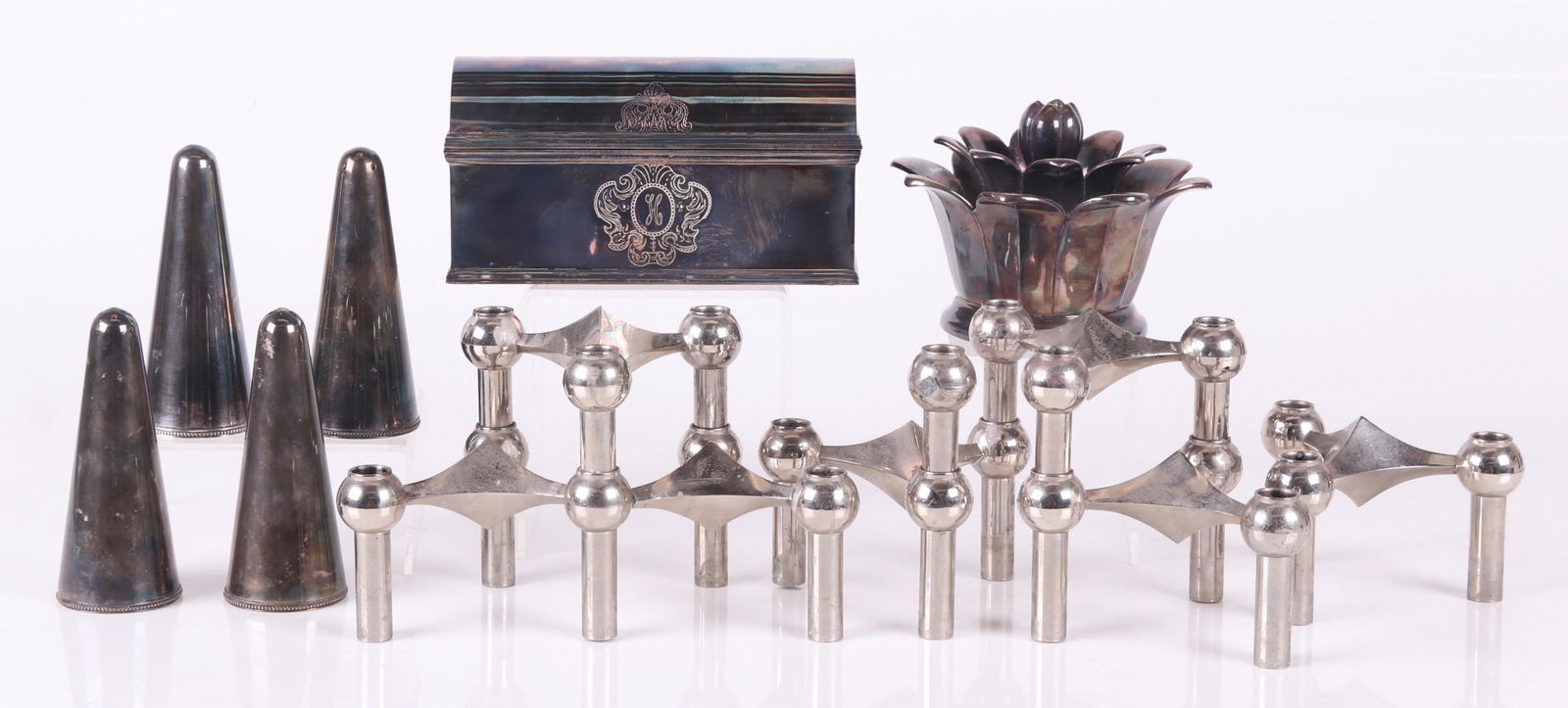 Mid Century Modern Chrome and Silver Plate Objects: A group of seven German three light chrome modular candle holders, by Fritz Nagel and Caesar Stoffi for BMF; a set of four British electroplated conical salt and pepper shakers by J. B. Chatterley and