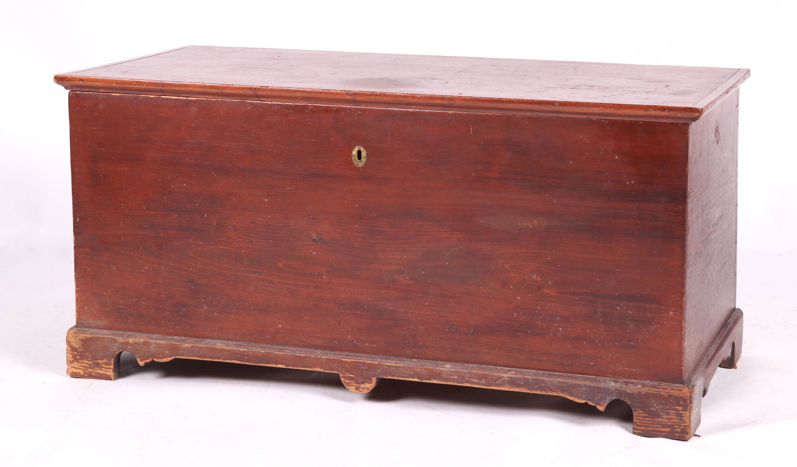American Pine Blanket Chest: Early 19th century. With straight bracket feet, dovetailed construction, and a hinged lid which opens to reveal a compartment with lidded till. Dimensions: 23" x 49", 23 1/2" in height. Provenance: Fr