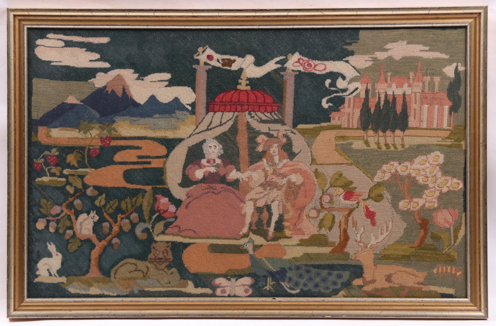 A 17th century Style Needlework Picture: Depicting a royal couple in a landscape and amidst animals, labeled verso "Designed by Ellen Macauley. embroidered by Elise L. Macauley, 1945-46". Dimensions: The frame is 23" x 35 1/2". Provenance: F