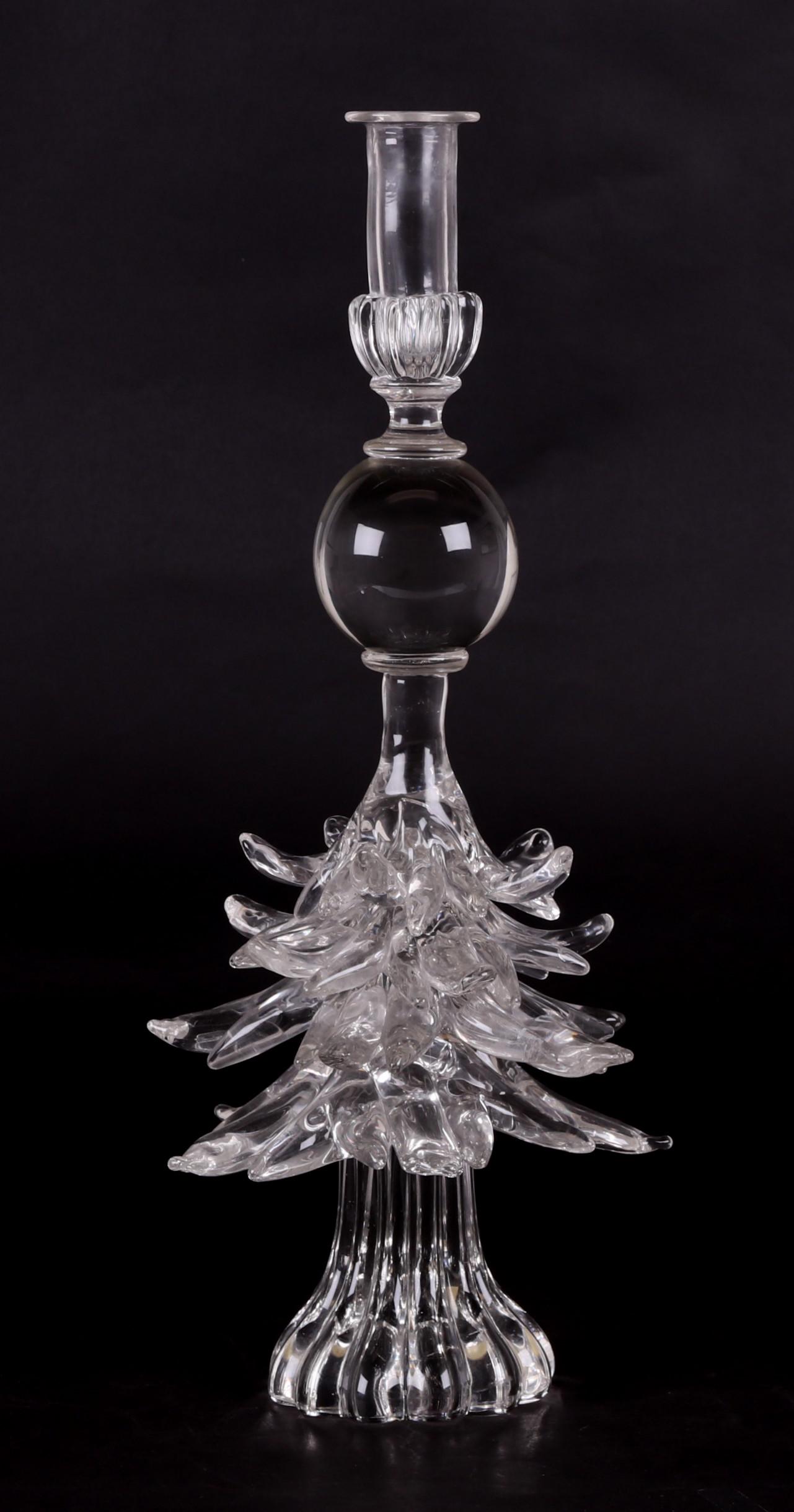 Murano Glass Candlestick by Archimede Seguso: A signed candlestick with a lobed foot, tree form shaft below a sphere and cylindrical nozzle. Dimensions: 7 1/2" in diameter at the widest point, 18" tall.