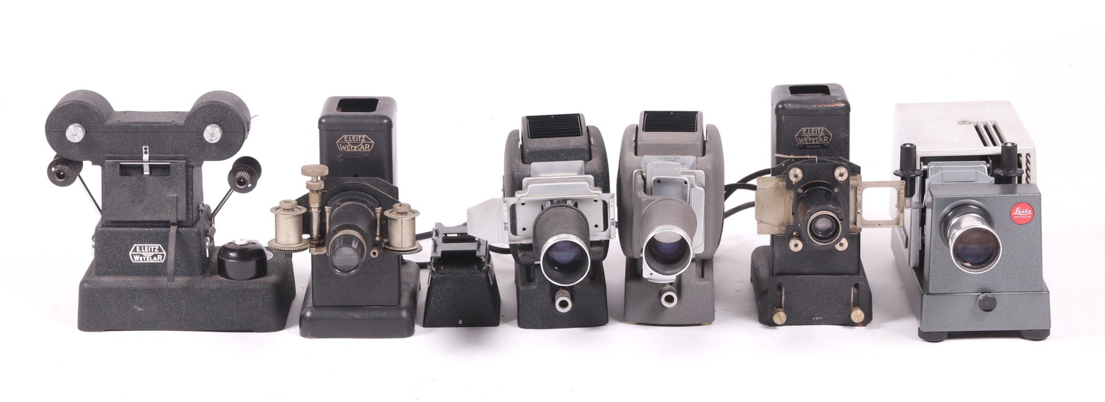 Leitz: Five Slide / Film Projectors, Slide Copier: Comprising: two 1930's projectors, a Prado 250 projector and a similar 1950's example, a 1960's Prado Universal projector, and a circa 1930's film copier. Also includes some accessories, and the bulbs