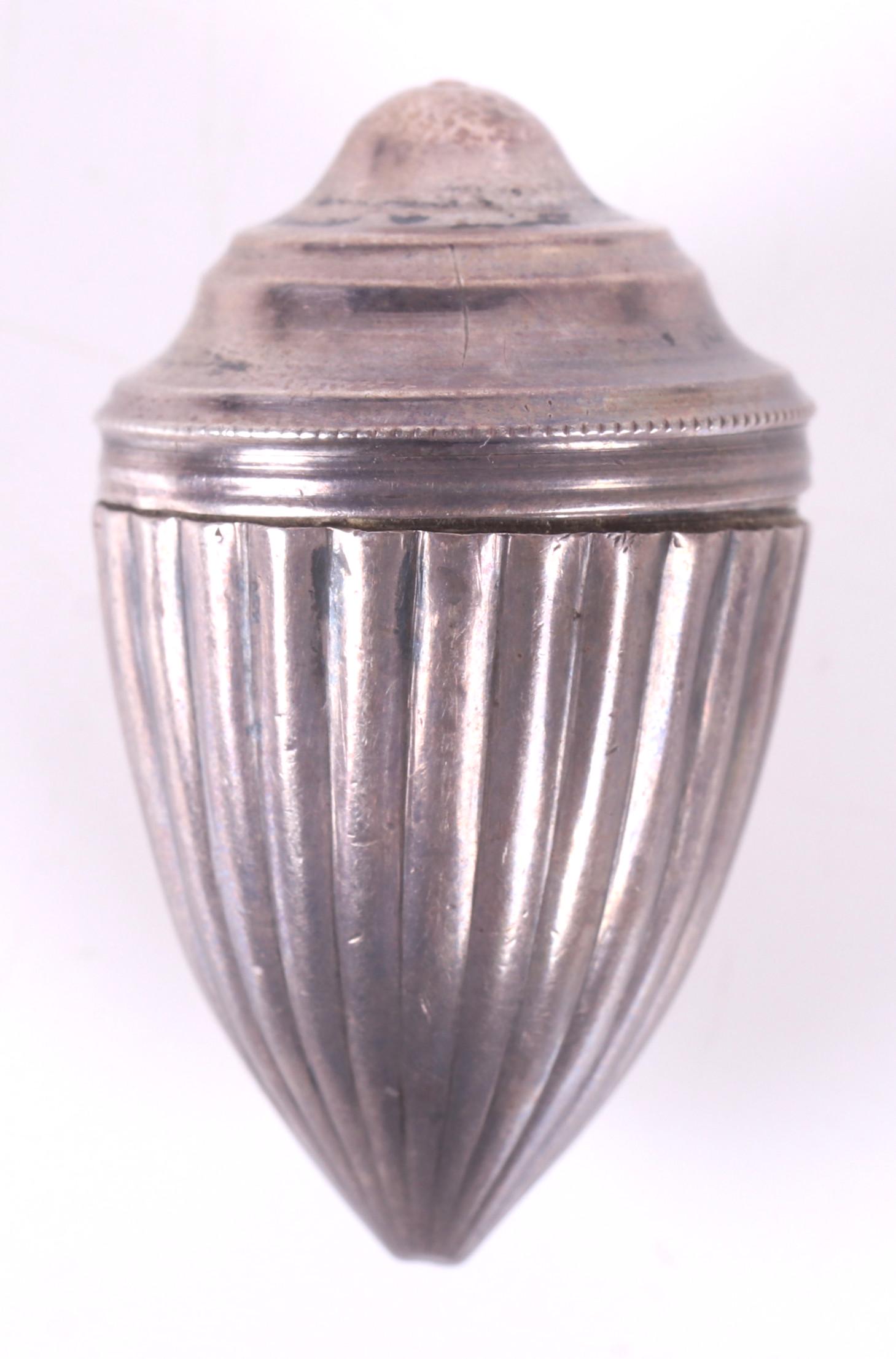 A Sterling Nutmeg Grater, George III: Hallmarked for Birmingham and 1801-02, in the form of an acorn. Dimensions: 1" in diameter, 1 1/2" tall, the approximate weight is .50 troy ounces. Provenance: From a Main Line collection.