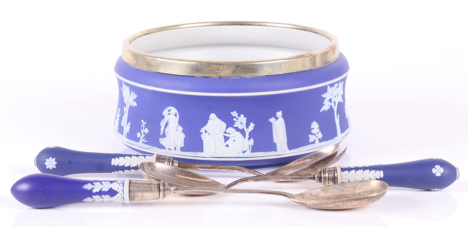 A Wedgwood Salad Bowl: A late 19th century dark blue Jasper dip salad bowl with silver plated rim, a matching salad set and other single spoon. Dimensions: The bowl is 9" in diameter and 4" tall, The utensils range from 8" 