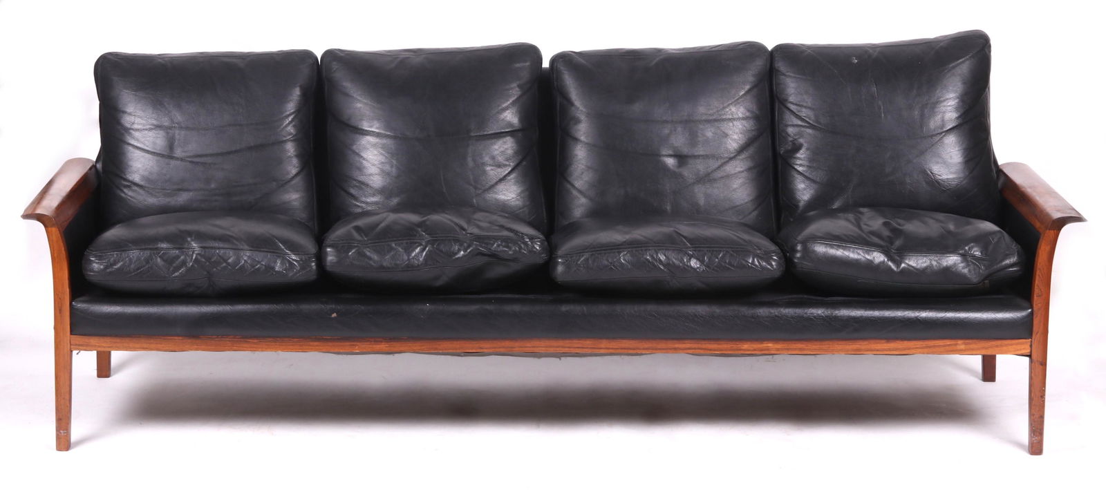Hans Olsen for Vatne Mobler, Sofa: A rosewood and black leather sofa circa 1960. Dimensions: 88" long, 29" deep, the seat height is 17".