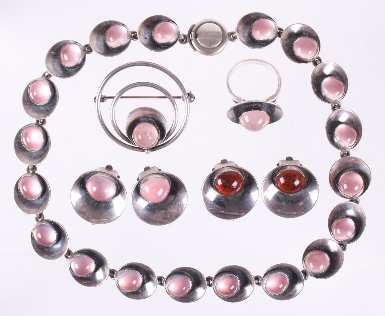 Group of N.E. From Silver Jewelry: A choker necklace with matching pin, earrings and ring, together with a similar pair of earrings. All signed. Dimensions:The necklace is 13" long, the pin has a diameter of 1 3/8", the ring is a size 