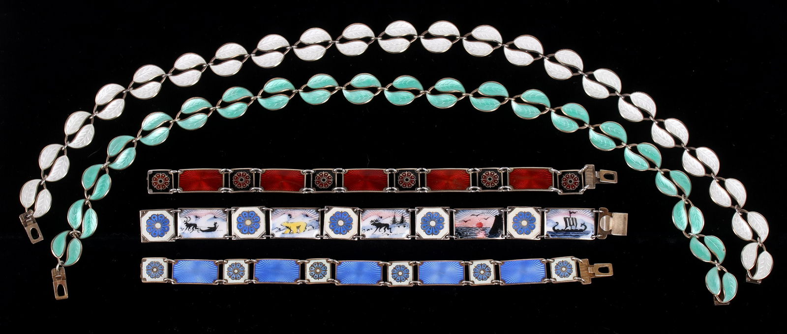 Sterling & Enamel Pieces of Jewelry, David Andersen: All signed for the maker and marked sterling. An orange example with floral elements, a similar blue bracelet, another that features flowers, animals, etc..., a white foliate necklace, and an identica