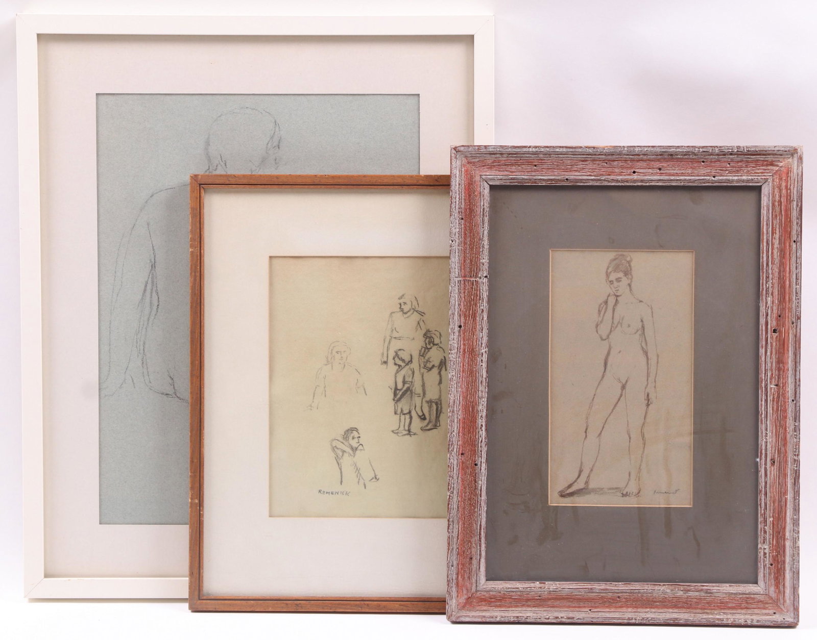 Seymour Remenick (1923 - 1999) Three Figural Works: A watercolor of a standing nude, a figure study, and a pencil sketch of a nude, all signed. Dimensions:The frames range from 16 1/2" x 12" to 21" x 17". Provenance:From a Philadelphia estate.