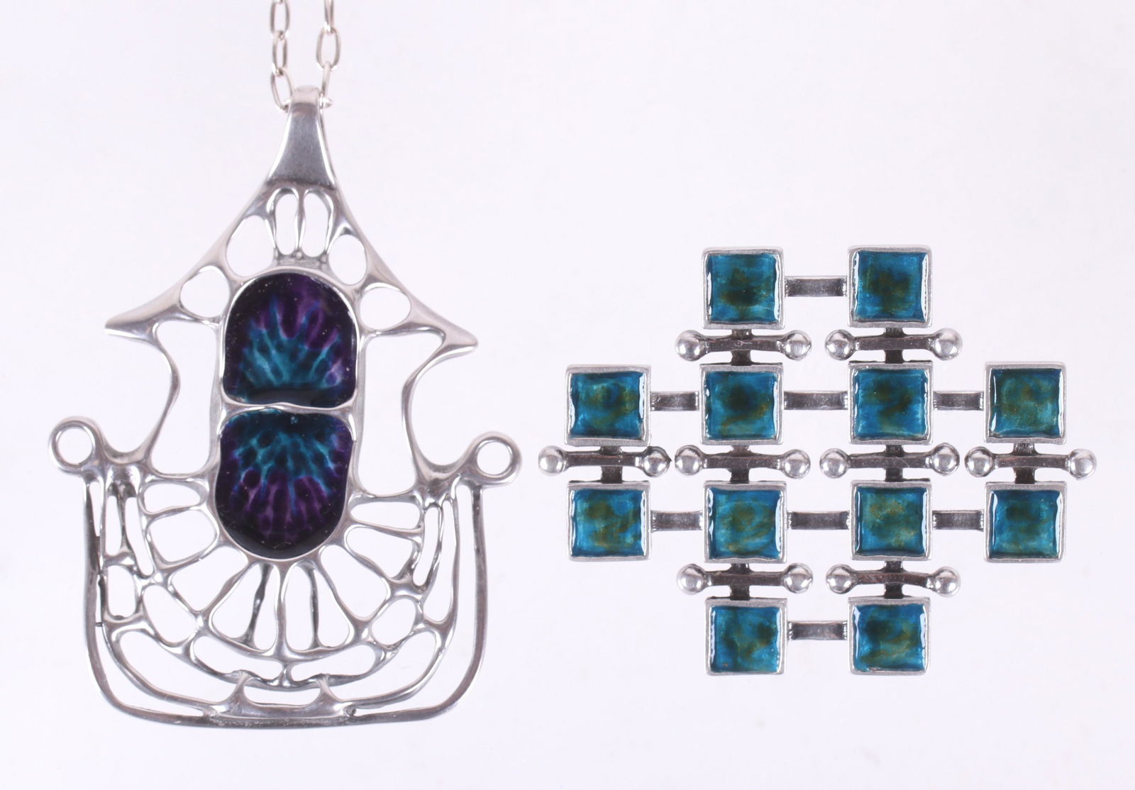 Two David Anderson Sterling Enamel Items: A Modernist pendant and brooch, each with colorful enamel decoration, signed as pictured. Dimensions:The brooch is 1 3/4" x 2" and the pendant is 2 1/2" x 1 3/4", the chain is 23" long. The total appr