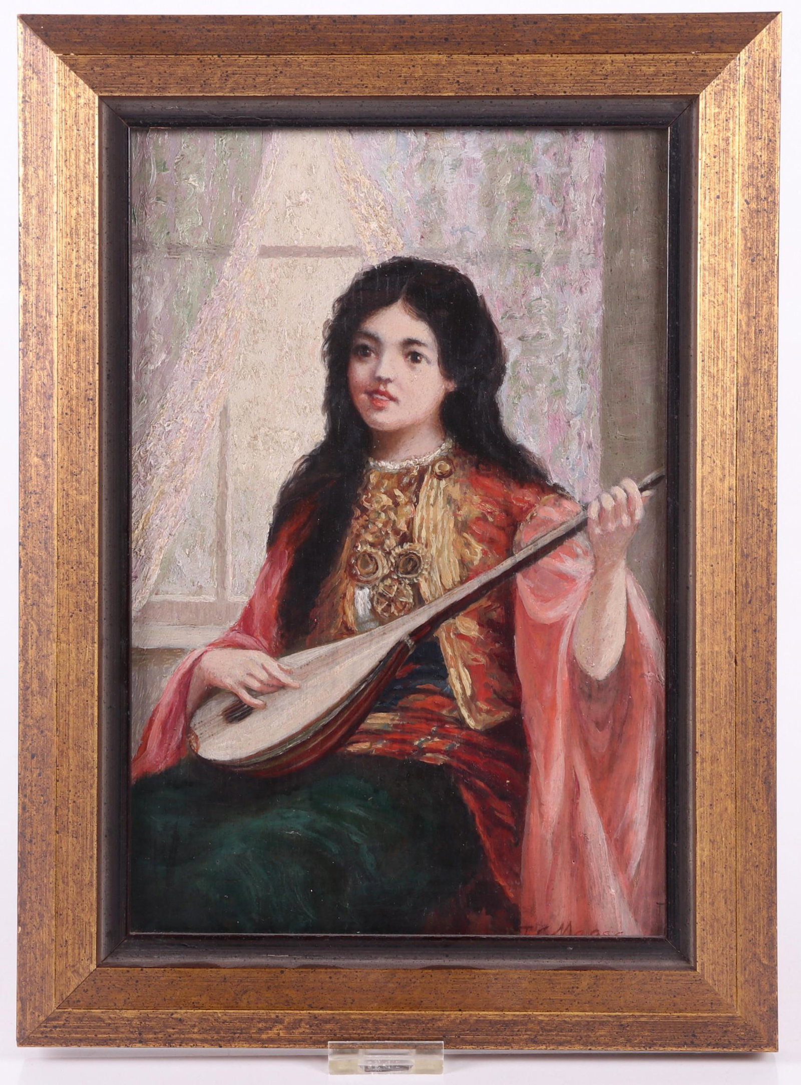 James C Magee (1846 - 1924) O/B Portrait: Oil on board, depicting a young woman playing a mandolin, signed at the lower right corner. Dimensions:11 1/2" x 7 1/2", the frame 14 1/2" x 10 1/2". Provenance:From a local collection.