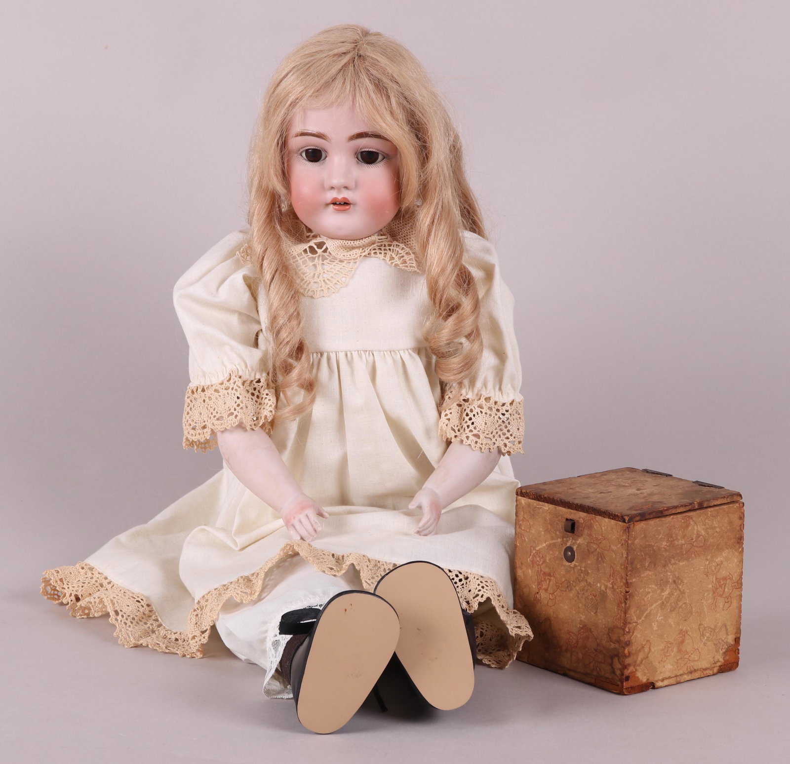 Large Kestner Bisque Head Doll #154: Early 20th century, with bisque head and arms, sleep eyes and open mouth, marked as pictured. Together with a vintage Donald Duck jack in the box. Dimensions: 28" tall. The jack in the box is 4 1/2" x