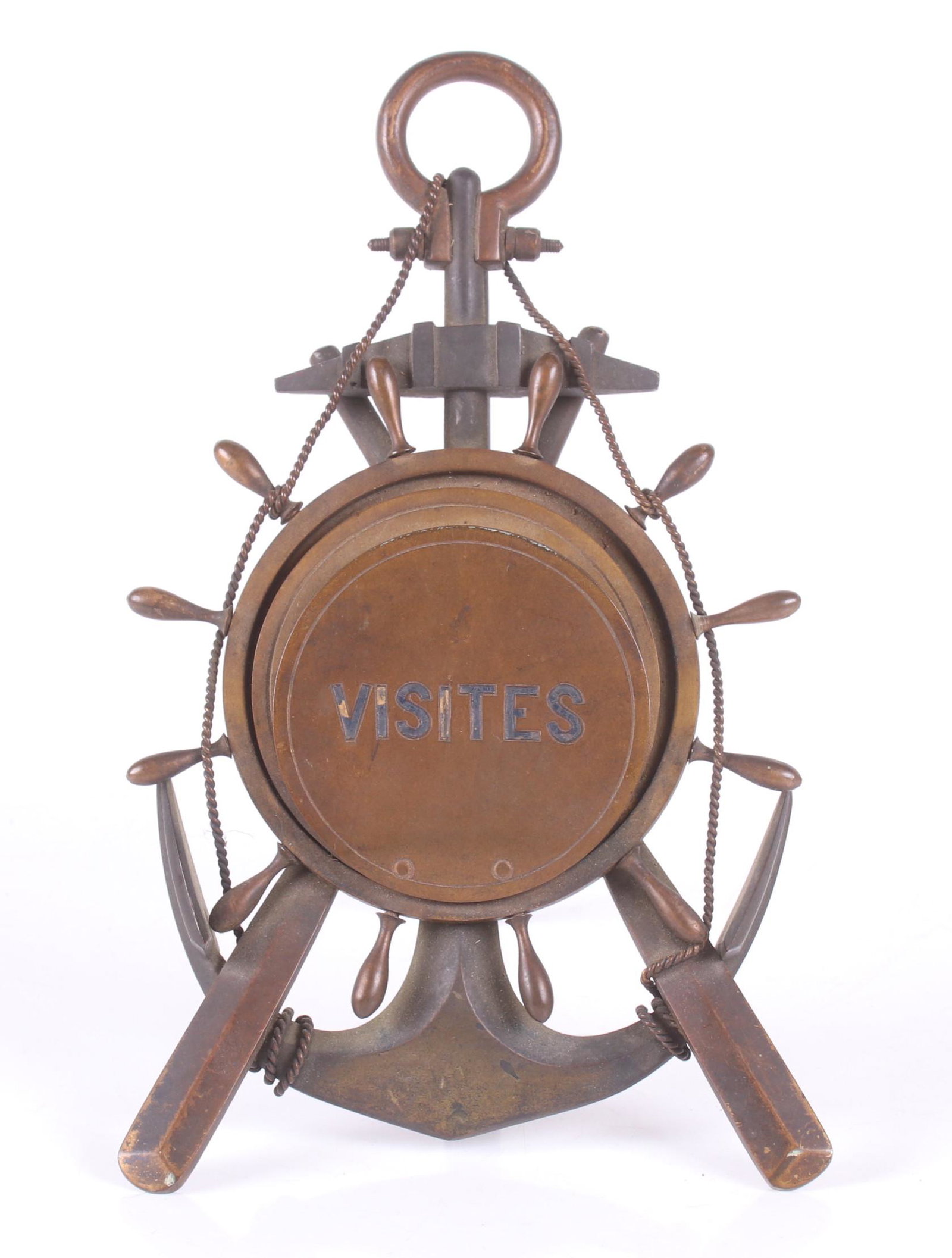 A Bronze Calling Card Holder: A 19th century nautical themed example with the word "Visites" at the center. Dimensions:5" x 6 1/2" in the open position, the height is 9".