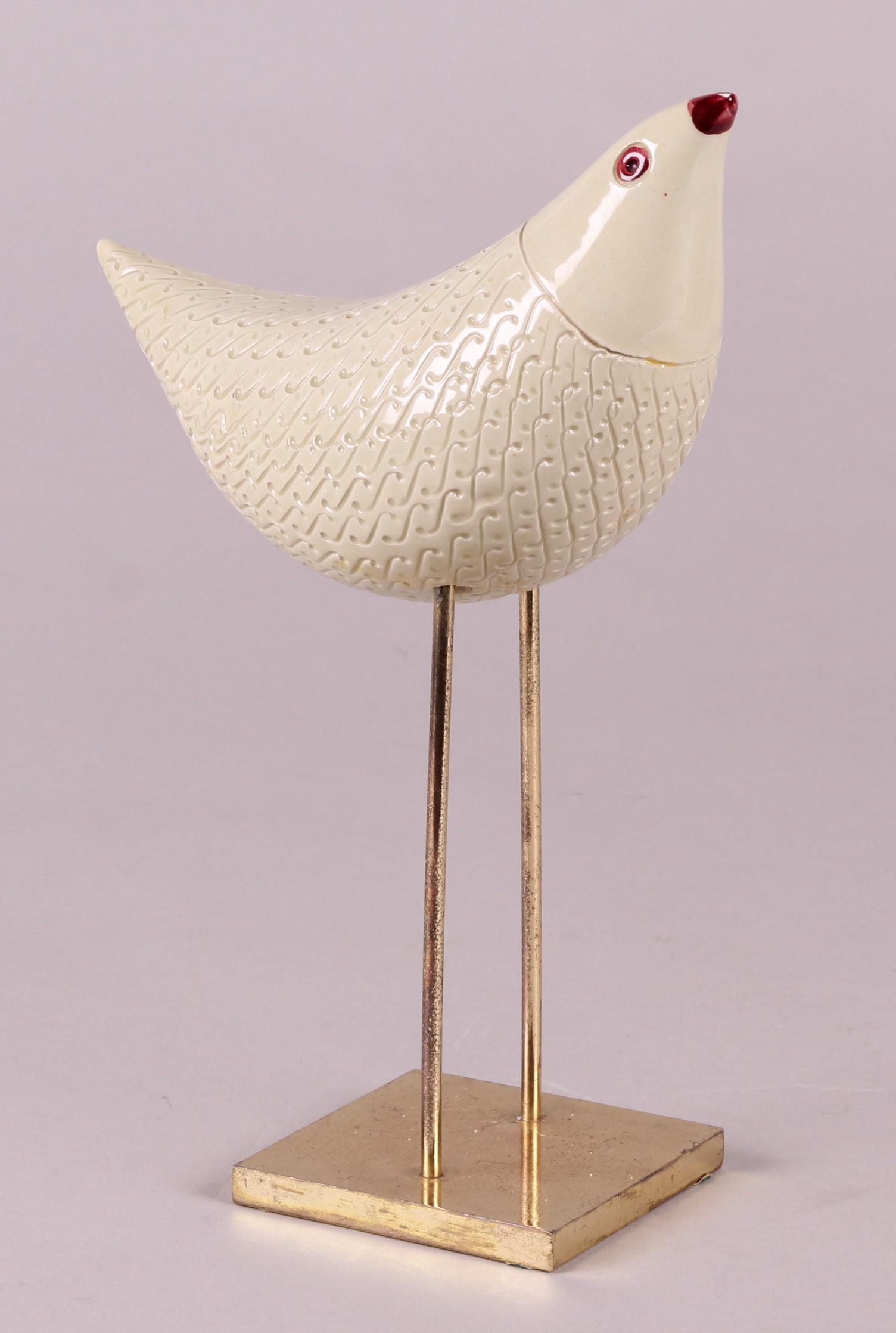 Aldo Londi for Bitossi, Pottery Bird: A pottery bird with incised decoration with brass legs and base, unmarked. Dimensions: 8" x 3 1/2", 11" tall.