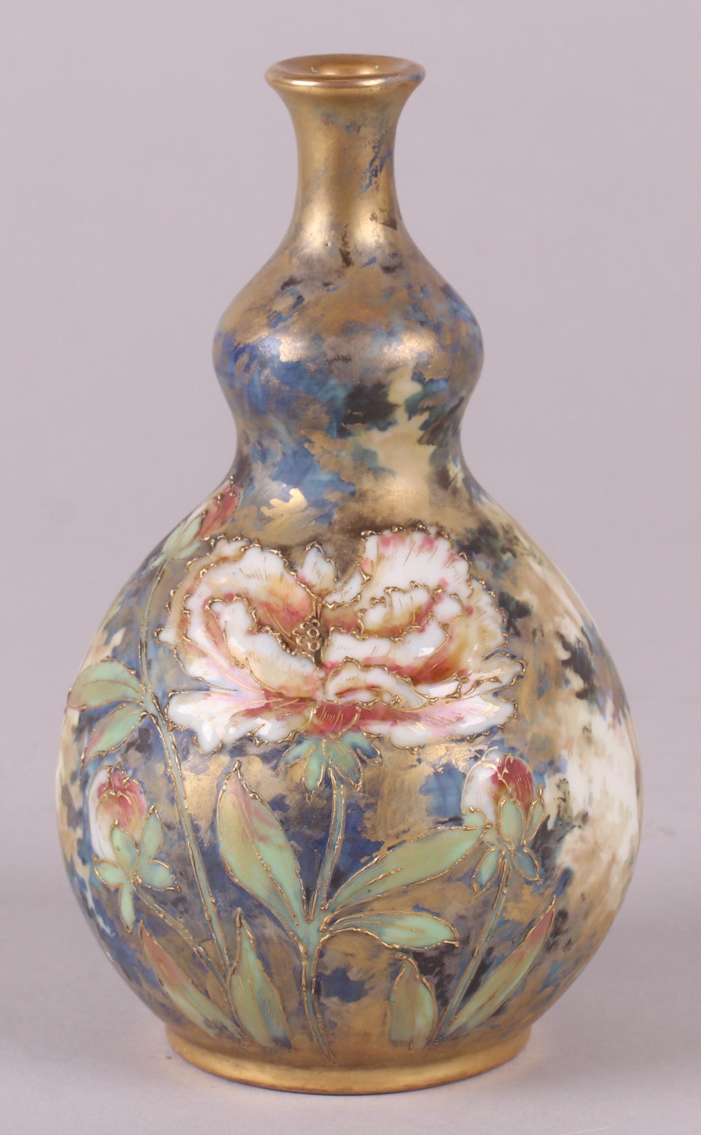 A Teplitz Amphora Vase, Art Nouveau: Circa 1900, gourd form with poppy decoration, marked as pictured. Dimensions: 4 1/2" in diameter, 7 3/4" tall.