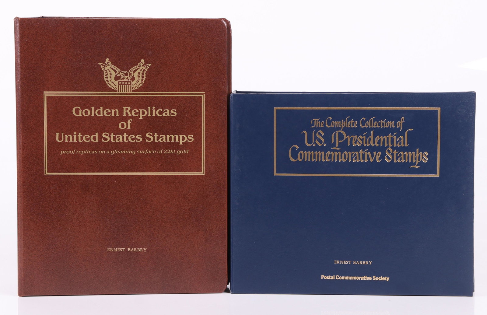 Two Collectible Albums of Stamps: The Complete Collection of U.S. Presidential Commemorative Stamps and Golden Replicas of United States Stamps, both Ernest Barbry, Postal Commemorative Society. Dimensions: The albums measure 10" x 12