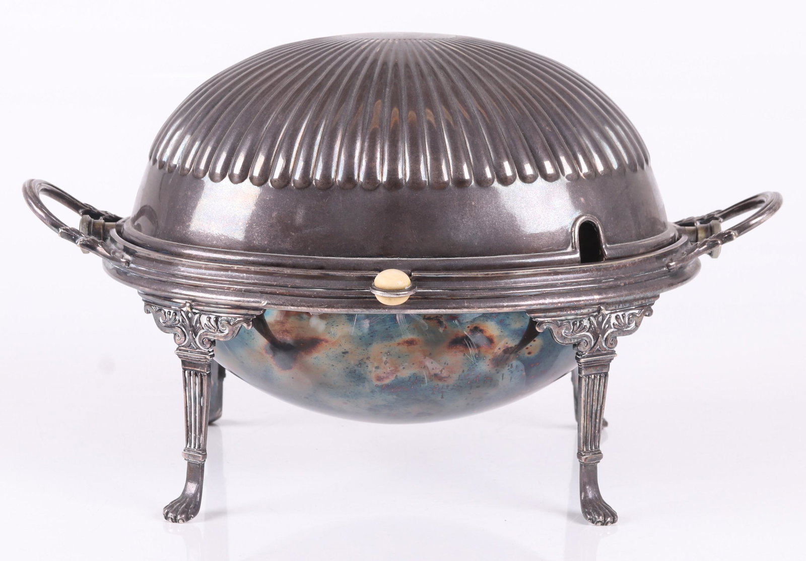 An English Silver Plated Breakfast Tureen: A Victorian example with neoclassical design elements. Dimensions: 15" from handle to handle, 10" deep and 9" tall.