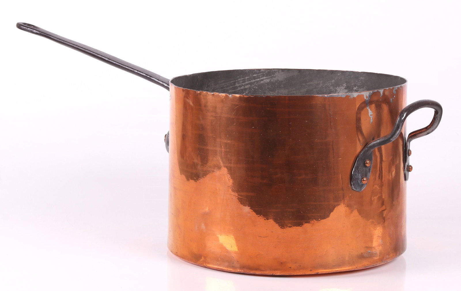 A 19th Century Copper Pot, V. Clad, Phila.: A large dovetailed example with wrought iron handles. Signed as pictured. Dimensions: 13 1/2" in diameter, 9 1/2" tall. The length including the handles 28". Provenance: From a local collection.