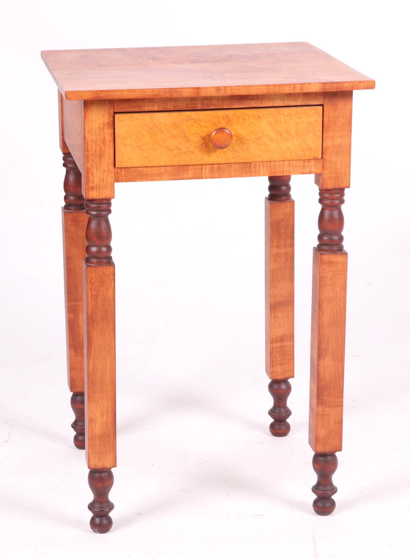 A Sheraton Style One Drawer Stand: Bench made by Thomas H. Jones (King of Prussia, PA) , author of "Heirloom Furniture You Can Build". Cherry and maple, with block and turned legs, single dovetailed drawer, all below the conforming rec