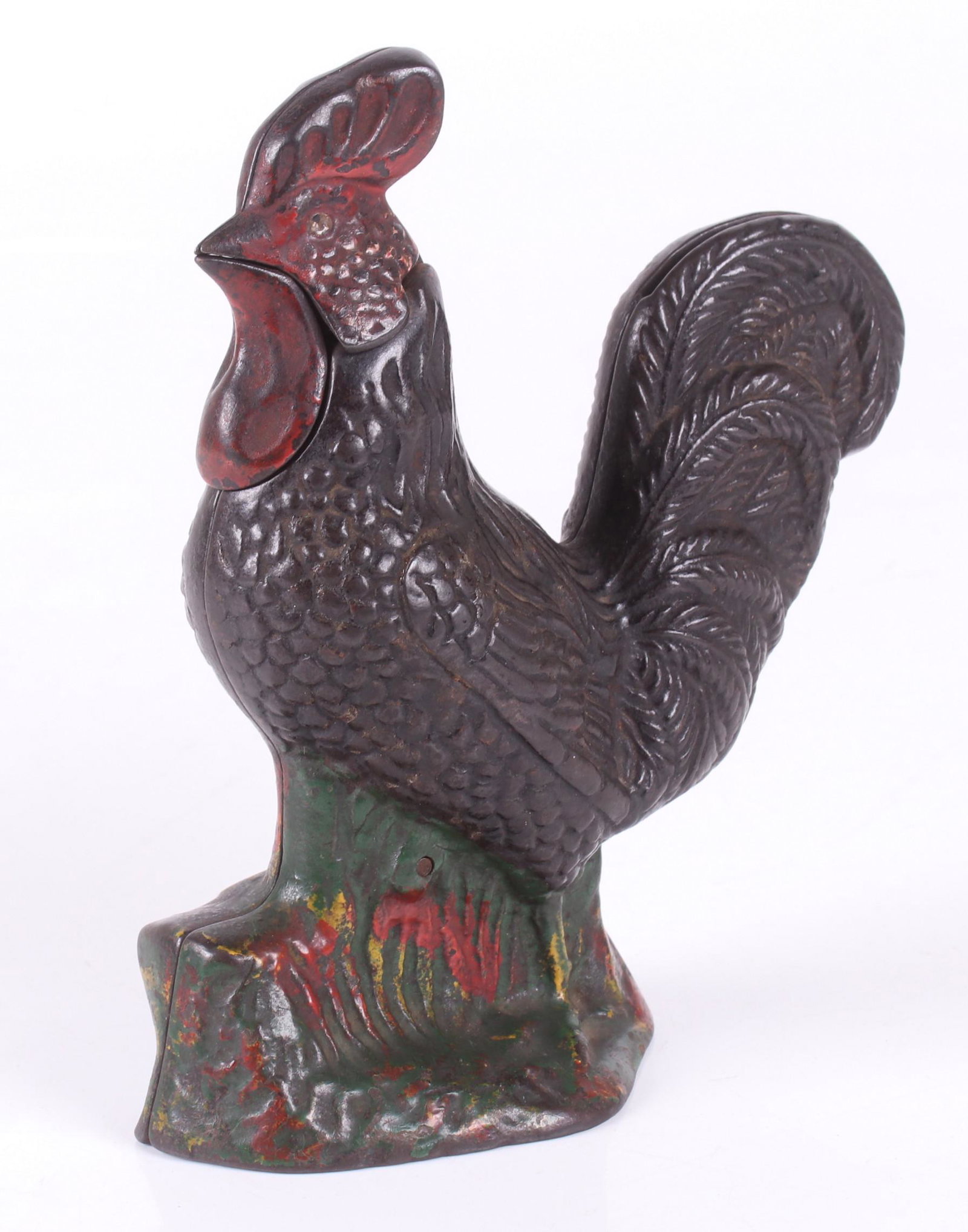 A Cast Iron Mechanical Rooster Bank: With original painted surface, by Kyser & Rex. Dimensions: 5" x 2", the height is 6 1/2".