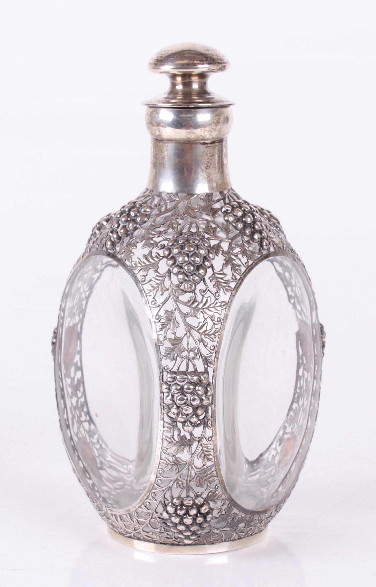 A Haig Whiskey Bottle, Chinese Silver Overlay (1 of 9)