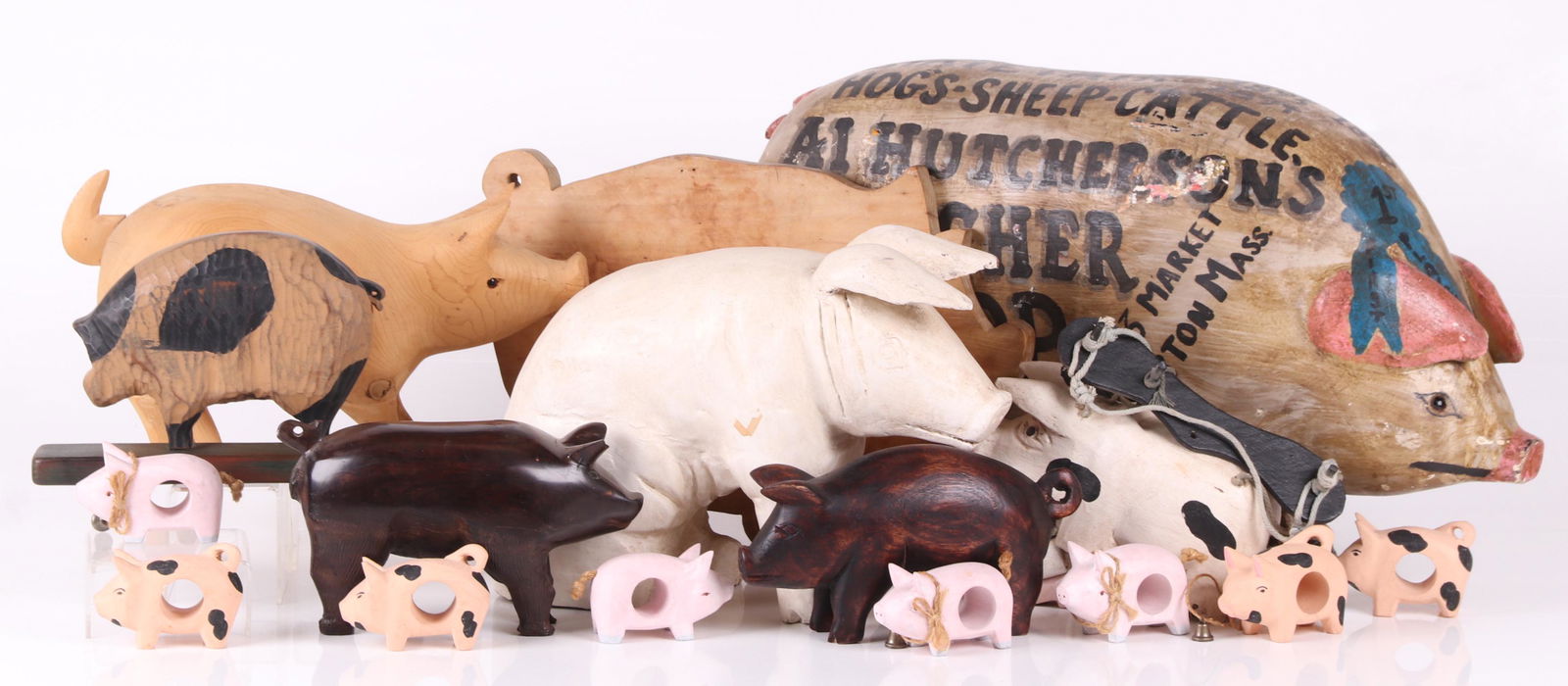 A Group of Wooden Pig Figures (1 of 16)