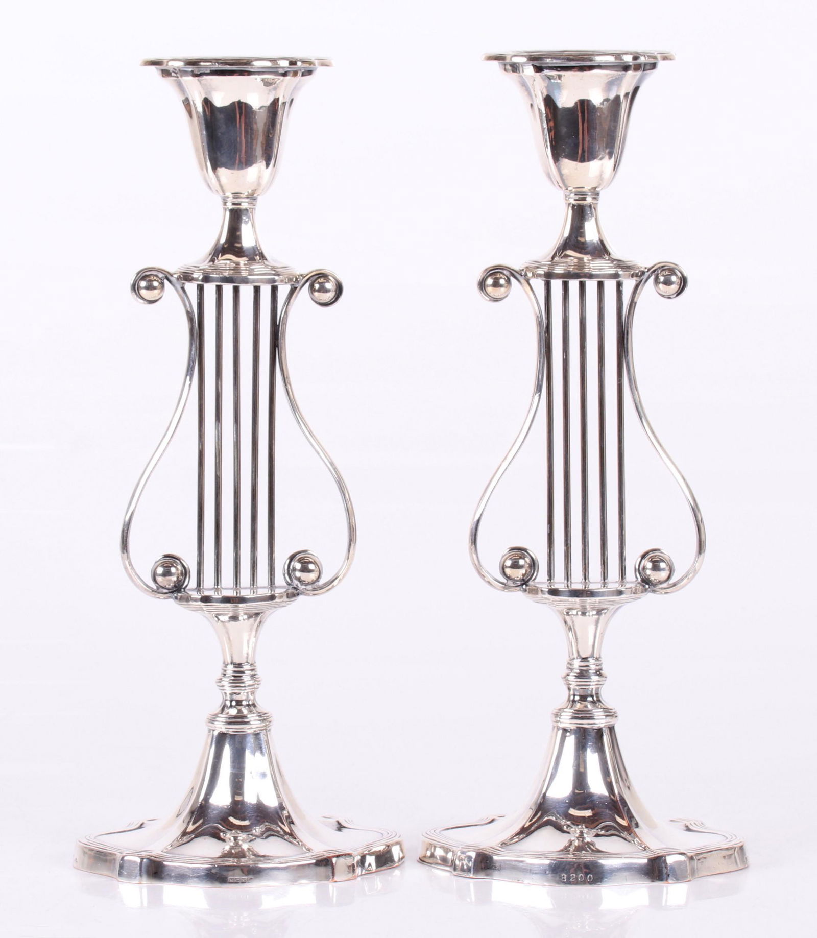 A Pair of Silver Plated Lyre Form Candlesticks (1 of 6)