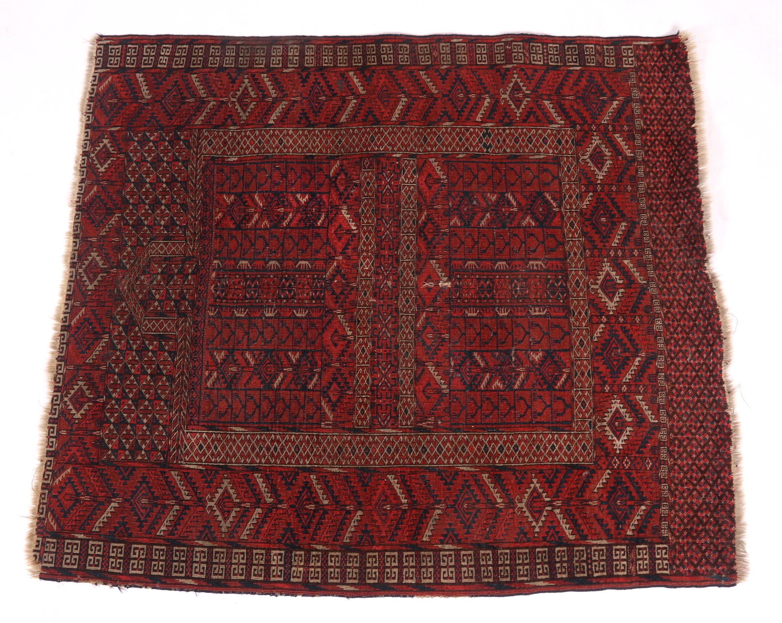 Oriental Rug, Tekke Bokhara: An antique prayer rug. Dimensions: 58" x 50 3/4". Provenance: From a Philadelphia estate.