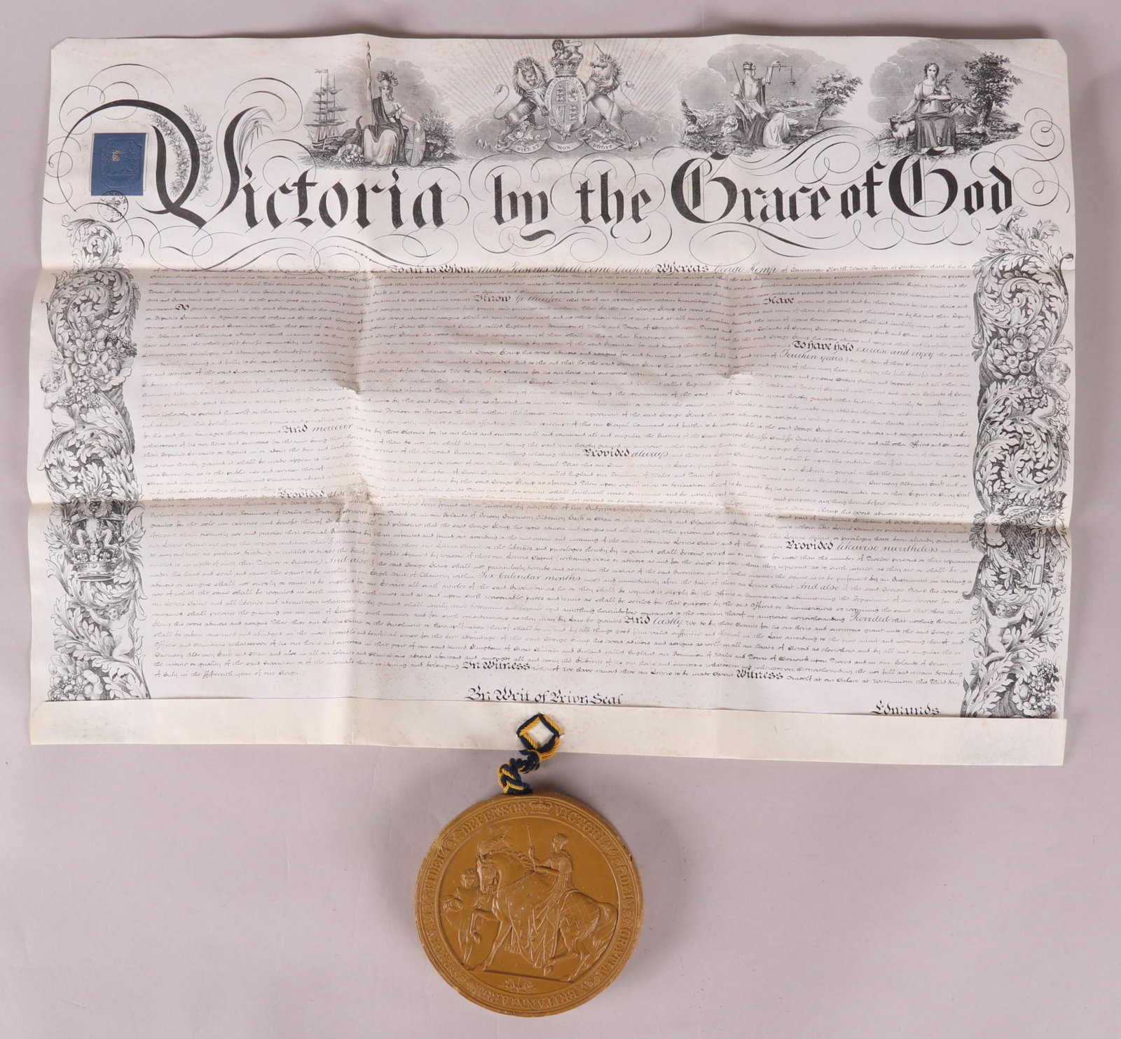 An English Vellum Deed with Wax Seal: Comprising: a document of agreement between George Kemp esq. and Thomas Smith esq, dated April 16th 1857 relating to patent of a electric motor of some type, a souvenir postcard related to the Coronat