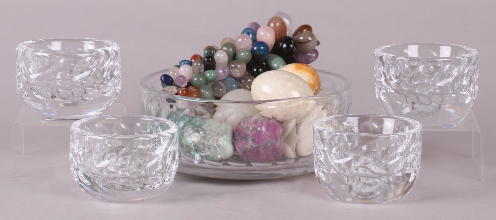 Orrefors Centerpiece bowl with Candleholders: A mid century centerpiece bowl with four matching candleholders by Orrefors. The lot includes the stone fruit and eggs as pictured. Dimensions:The bowl is 8 1/2" in diameter and 3 1/4" tall, each cand
