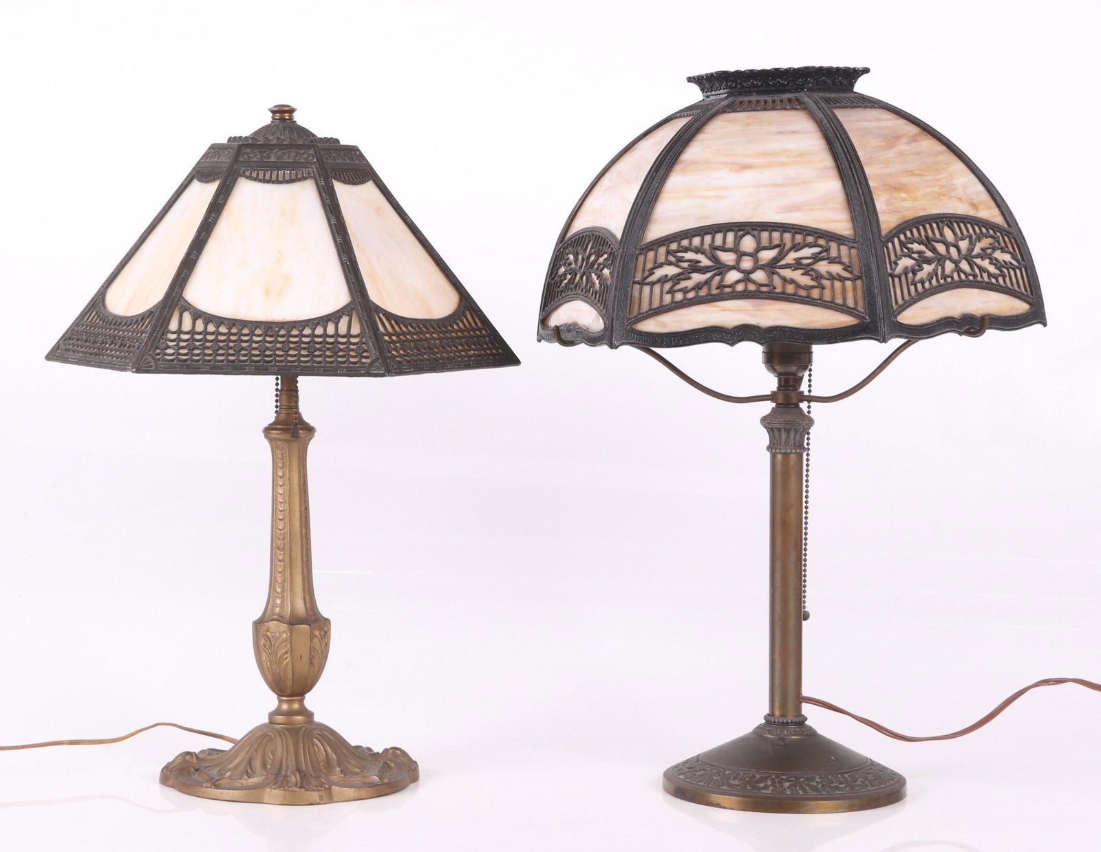 Two Signed Slag Glass Lamps: Both circa 1900-20, one by the Pittsburgh Lamp Brass & Glass Company and the other by Edward Miller co. Both have a caramel slag glass shade. Dimensions:The shade of the Miller lamp is 14" in diameter