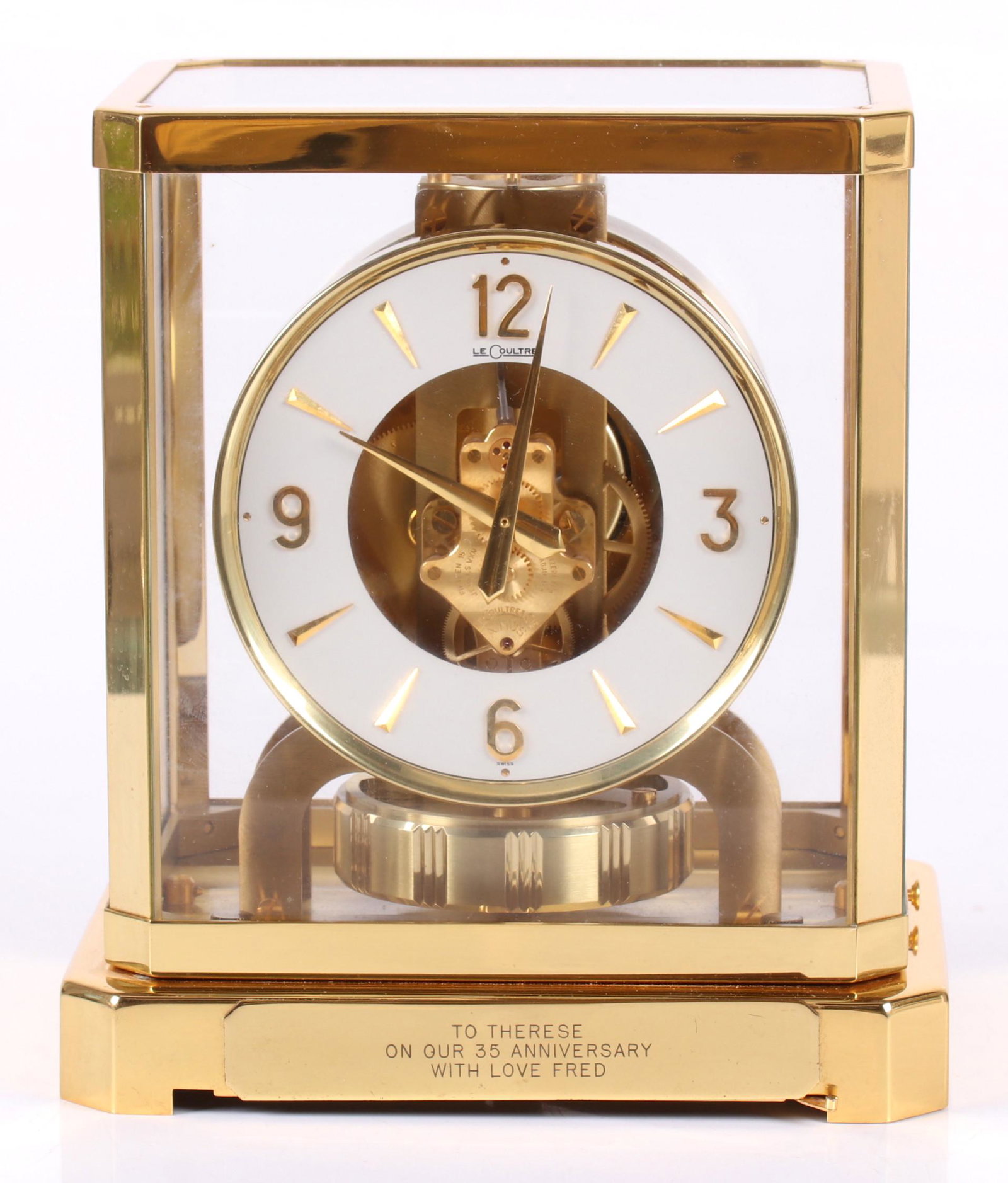 Jaeger-LeCoultre Brass Atmos Clock: Serial number 174803, circa 1960, with presentation plaque. Dimensions: 8 1/4" x 6 1/2" and 9 1/4" tall. Provenance: From a local collection.