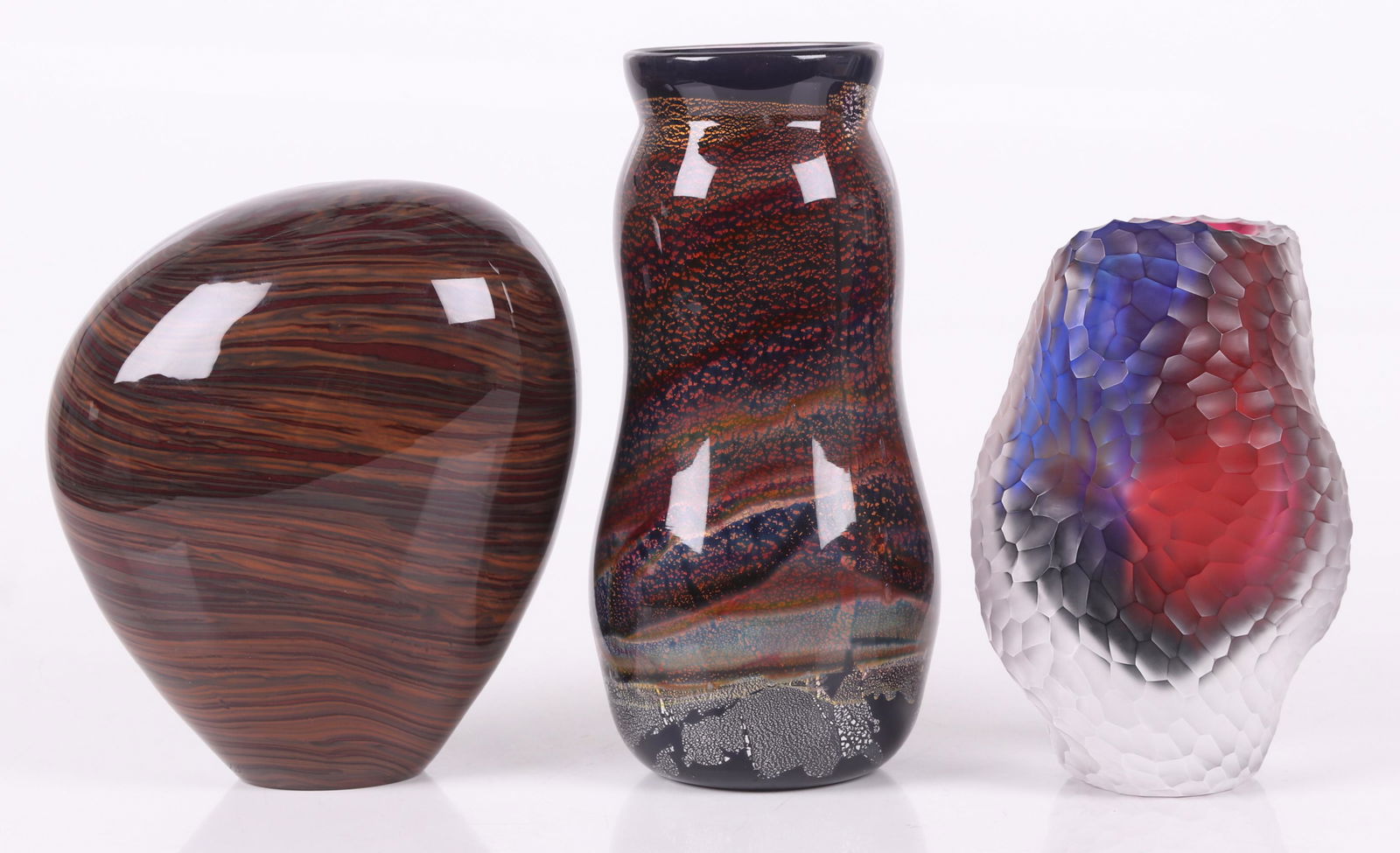 Three Pieces of Art Glass Including Bernard Katz: A jar form vessel signed "Fitz" probably for William Fitz and dated for 2006, a glass sculpture signed for Bernard Katz and a multicolored vase which is illegibly signed and features a chip carved sty
