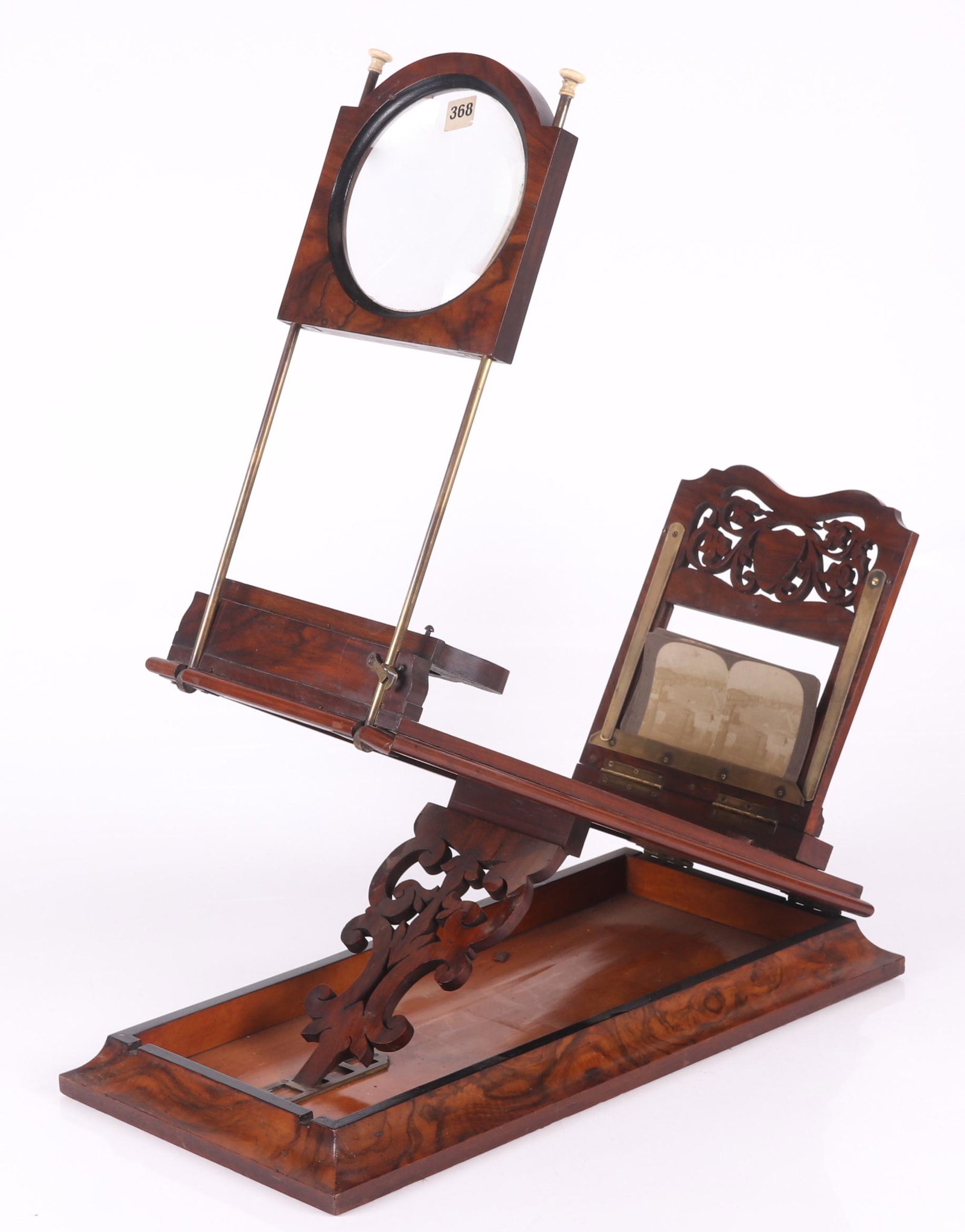 A Rowsell's Graphoscope, c. 1870: Rosewood, with open fretwork decoration and inlaid maker's mark. Dimensions: 23" x 12", the height is 21".